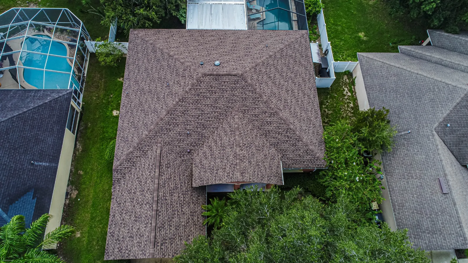 Aerial view of a Stronghold shingle roof replacement on a Florida ranch-style home