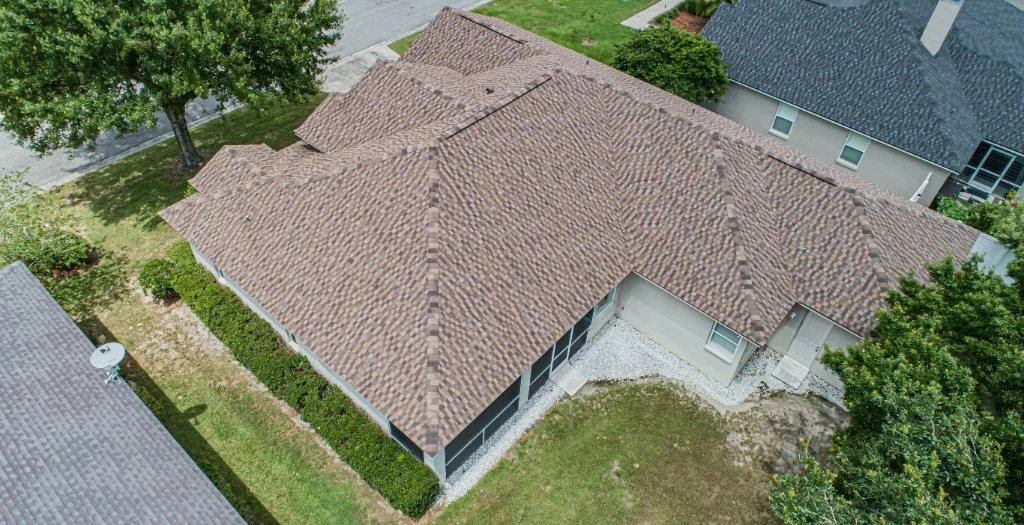 Stronghold Roofing installed a brown shingle roof on a ranch home in Cape Coral, FL.