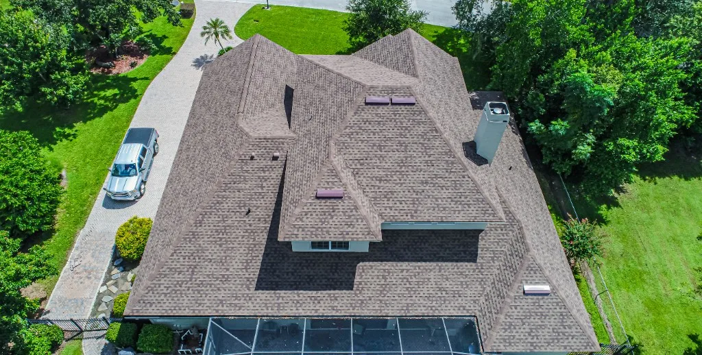 Stronghold Roofing installed a brown shingle roof on a ranch style home in Clearwater, FL.