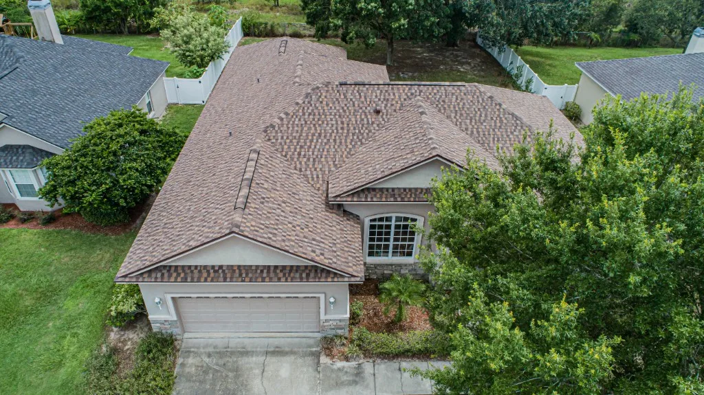 Stronghold Roofing installed this brown shingle roof on a ranch home in Ocala, FL.