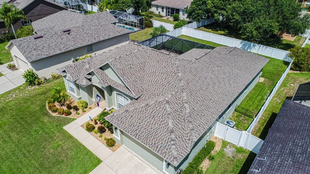 Stronghold Roofing completed a brown shingle roof on this ranch-style home in Orlando, FL.