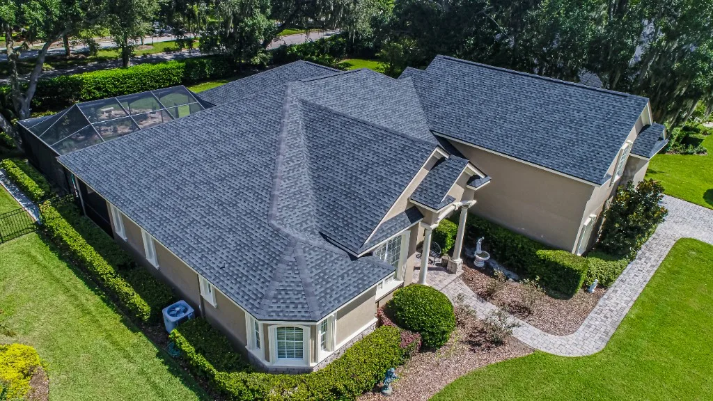 Stronghold Roofing installed a new black shingle roof on a ranch home in Tampa, FL.