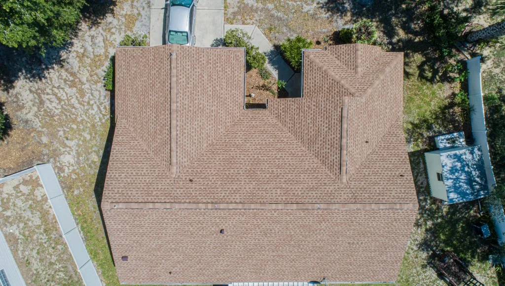 Stronghold Roofing installed this tan shingle roof in Venice, FL.