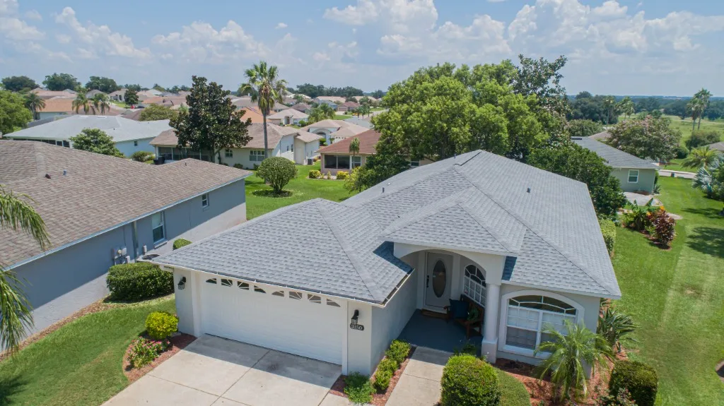 Stronghold Roofing installed a gray shingle roof on a ranch-style home in Winter Haven, FL.