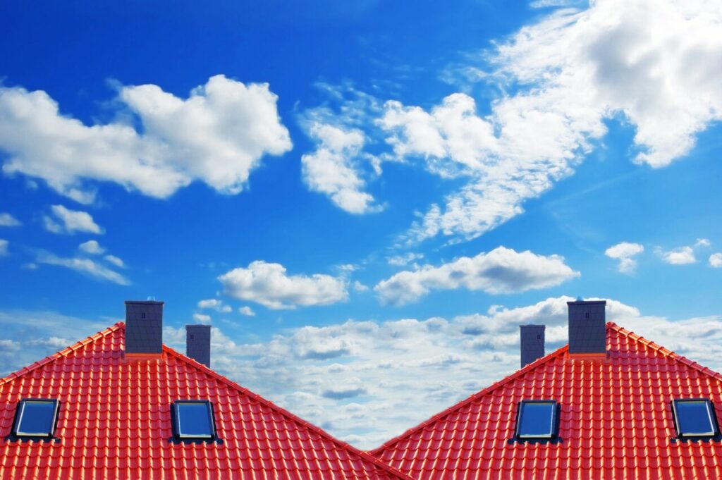 Color roofs on two houses in Lakeland, FL