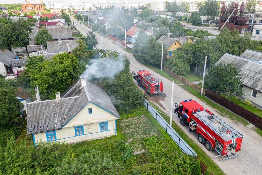 Defending against roof fires with a fire fighting machine