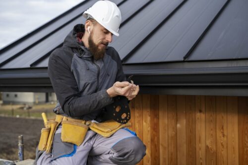A Lakeland roofer replacing drip edges